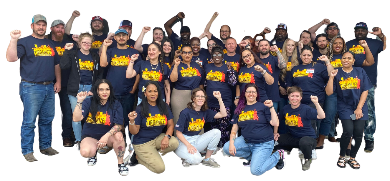 A group of 40 organizers posing with fists raised on a transparent background